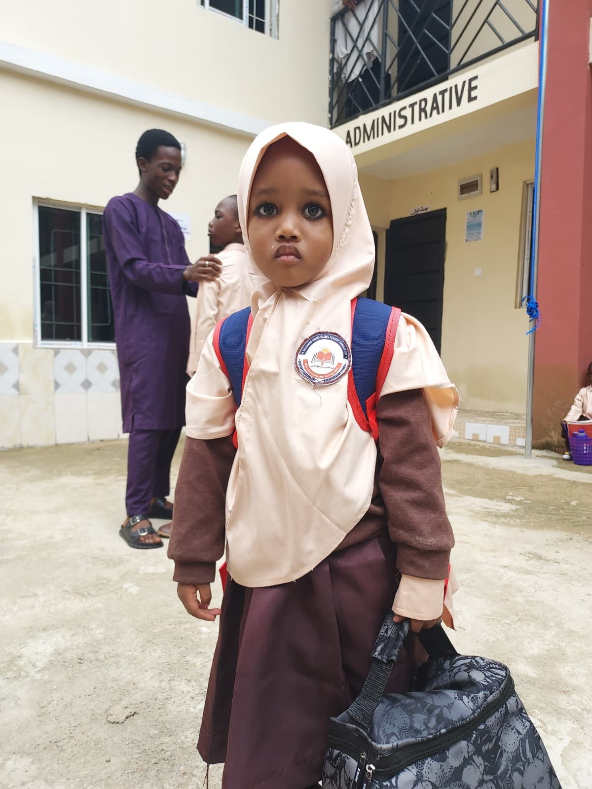 Female pupil standing with confidence