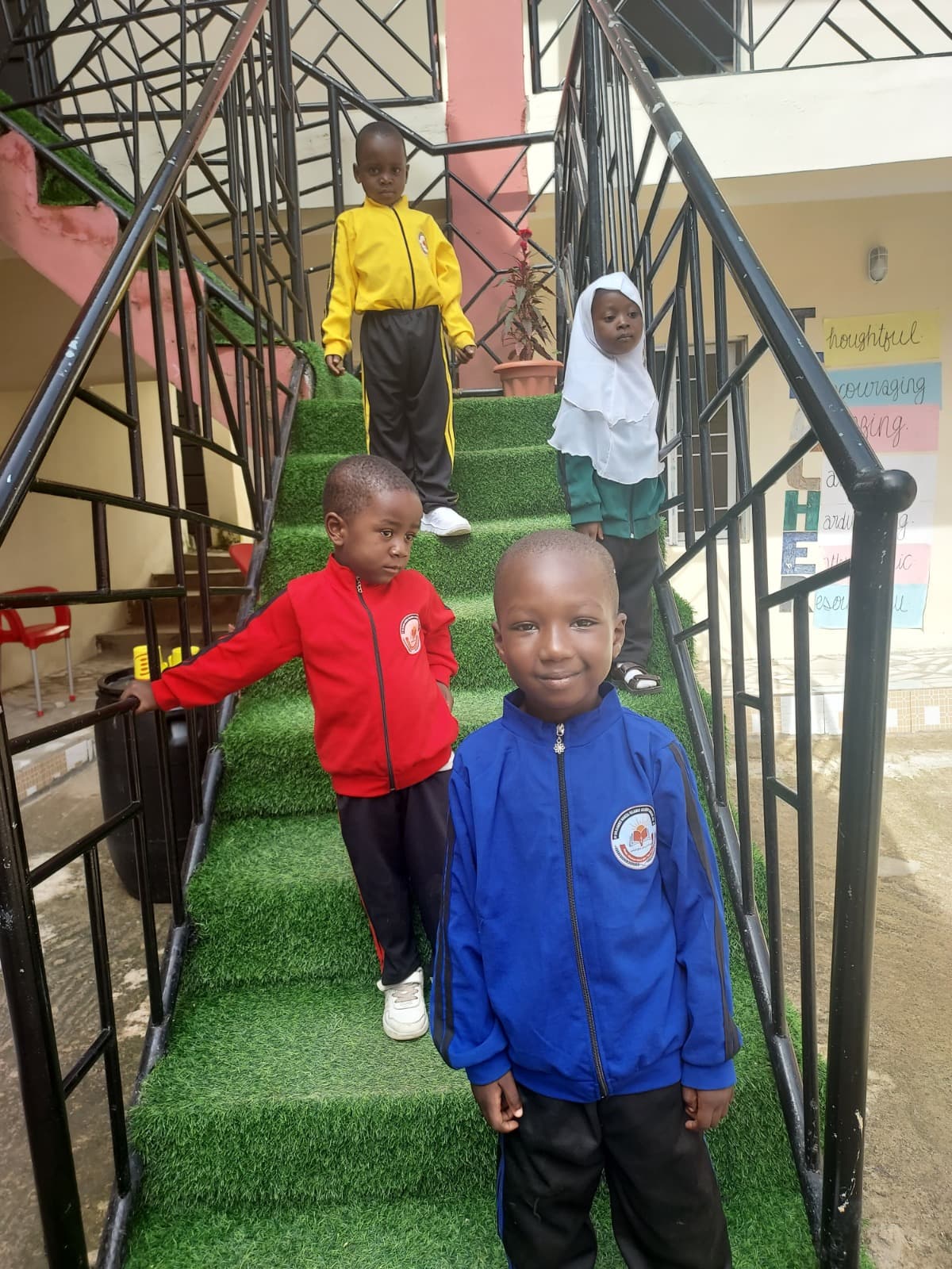 Pupils smiling on the walkway